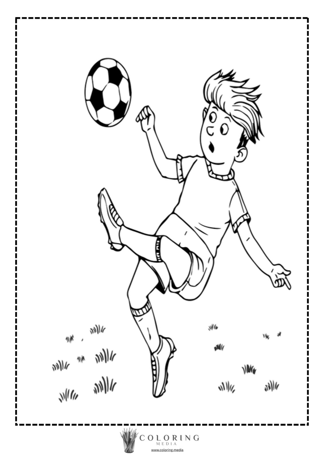 A boy in a soccer uniform kicks a ball while looking surprised.
